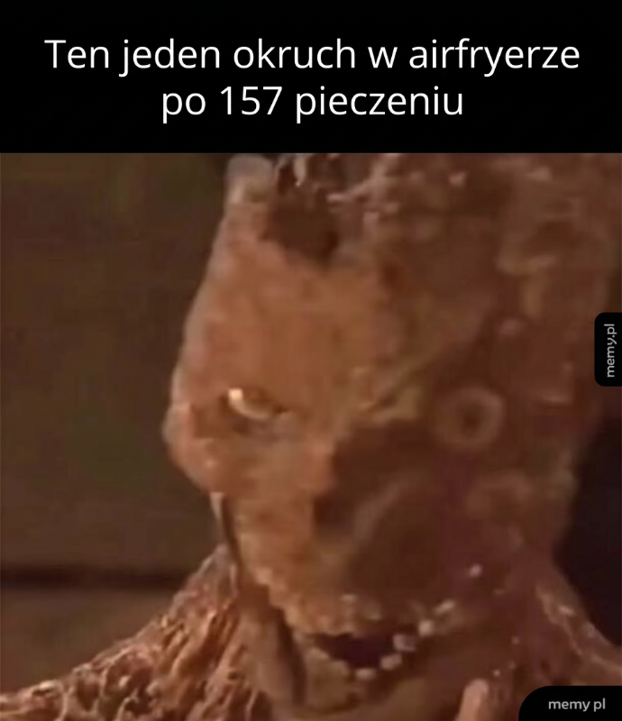 Postać z przypieczoną skórą, z wyrazem twarzy pełnym zaskoczenia.