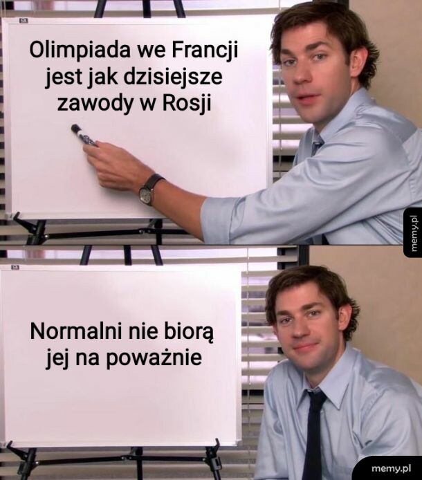 Mężczyzna pokazuje na tablicę z napisem o olimpiadzie we Francji