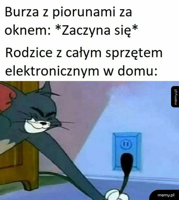 Kot Tom wyciągający wtyczkę z kontaktu z uśmiechem na twarzy
